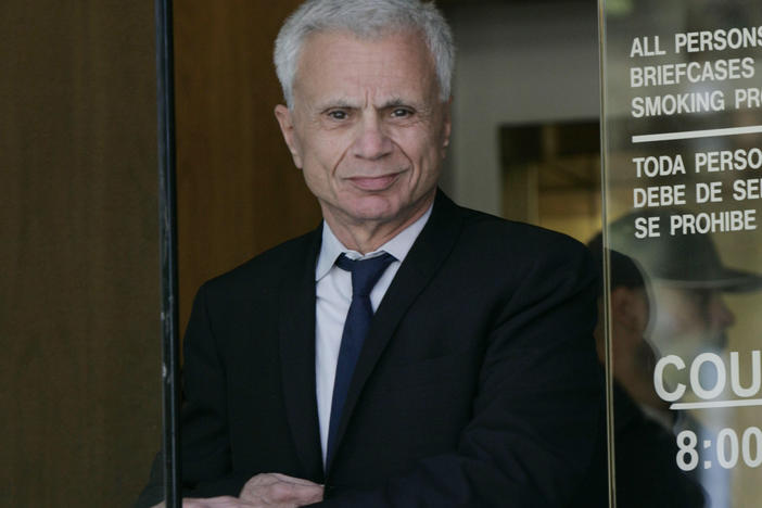 Actor Robert Blake is shown leaving court on Oct. 3, 2005, after his second day of testimony in a wrongful death lawsuit, brought by the family of Bonny Lee Bakley, in Burbank, Calif.