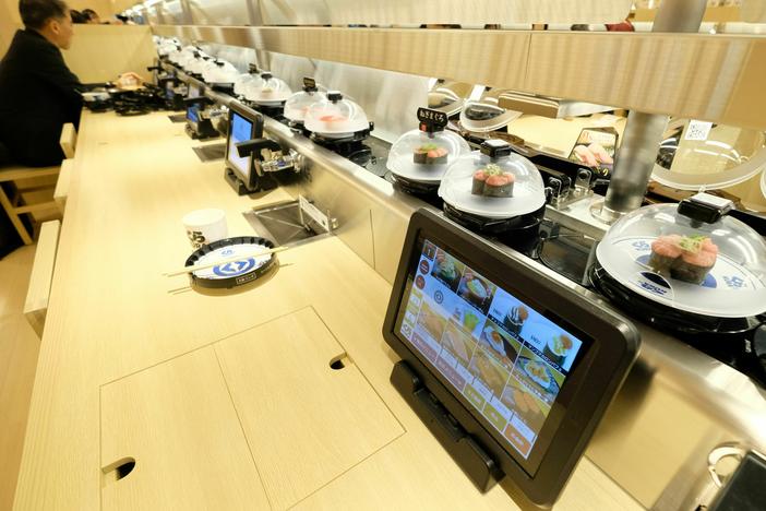 The global flagship store for Kura Sushi, a Japanese conveyor-belt sushi restaurant chain, is pictured here in January 2020 in Tokyo. Conveyor-belt sushi restaurants have been the target of a spate of pranks.