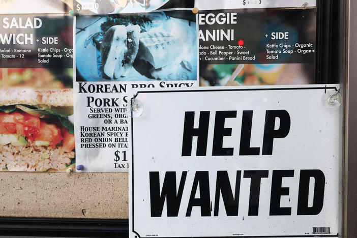 A "Help Wanted" sign is posted at a restaurant in Los Angeles on Feb. 2, 2023. U.S. employers added 311,000 jobs last month, a number that indicates the labor market remains fairly hot.