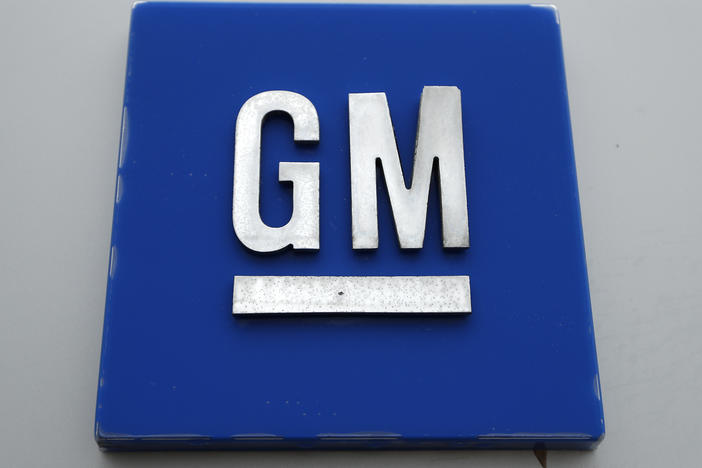 The General Motors logo is displayed outside the General Motors Detroit-Hamtramck Assembly plant, Jan. 27, 2020, in Hamtramck, Mich.