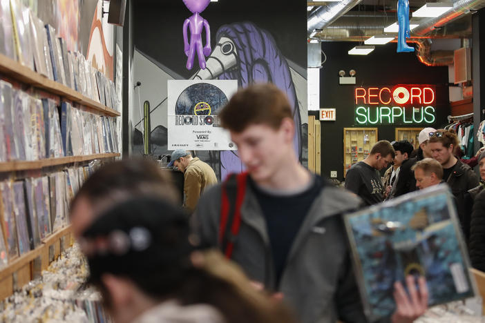 Customers shop at the Shuga Records store during the Record Store Day in Chicago on April 13, 2019. Vinyl record sales have been on the rise for 16 straight years, with an extra bump in demand during the pandemic.