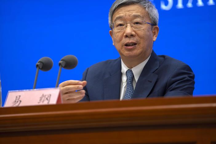 FILE - Yi Gang, governor of the People's Bank of China, speaks during a press conference at the State Council Information Office in Beijing, on March 3, 2023. China on Sunday, March 12, reappointed Yi as head of the central bank in an effort to reassure entrepreneurs and financial markets by showing continuity at the top while other economic officials change.