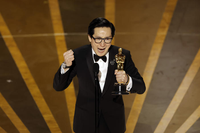 Ke Huy Quan accepts the Academy Award for best supporting actor for <em>Everything Everywhere All at Once</em> at the 95th Annual Academy Awards at Dolby Theatre on March 12, 2023 in Hollywood, Calif.