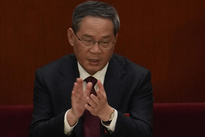 Politburo Standing Committee member Li Qiang attends a session of China's National People's Congress at the Great Hall of the People in Beijing, Tuesday, March 7, 2023.