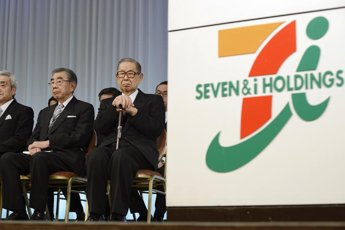Seven & I Holdings Co. founder and honorary chairman Masatoshi Ito, right, attends the company's initiation ceremony for new employees in Tokyo, Japan, on March 13, 2014.