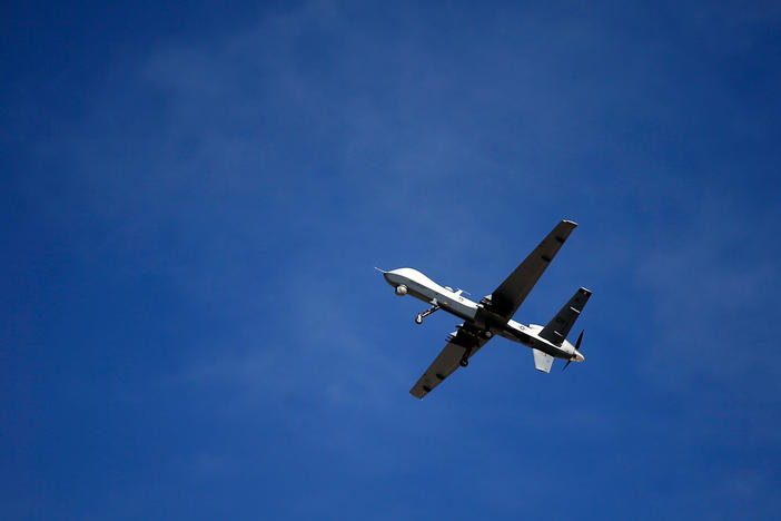 An MQ-9 Reaper remotely piloted aircraft flies by during a training mission at Creech Air Force Base in Nevada on Nov. 17, 2015.