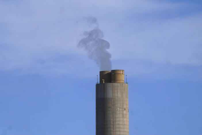 A smokestack stands at a coal plant on June 22, 2022, in Delta, Utah. The Environmental Protection Agency issued a final rule Wednesday to restrict smokestack emissions from power plants and other industrial sources that burden downwind areas with smog-causing pollution they can't control. (