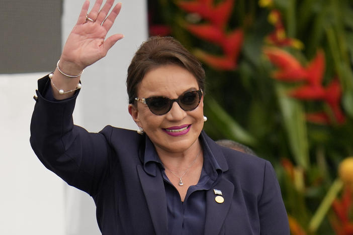 Honduras' President Xiomara Castro waves during the swearing-in ceremony for Colombia's President Gustavo Petro in Bogota, Colombia, Sunday, Aug. 7, 2022. Castro announced on Tuesday, March 14, 2023, that Honduras under her administration is opening diplomatic relations with the People´s Republic of China.