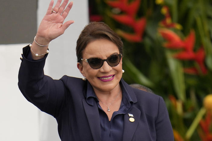 Honduras' President Xiomara Castro waves during the swearing-in ceremony for Colombia's President Gustavo Petro in Bogota, Colombia, Sunday, Aug. 7, 2022. Castro announced on Tuesday, March 14, 2023, that Honduras under her administration is opening diplomatic relations with the People´s Republic of China.