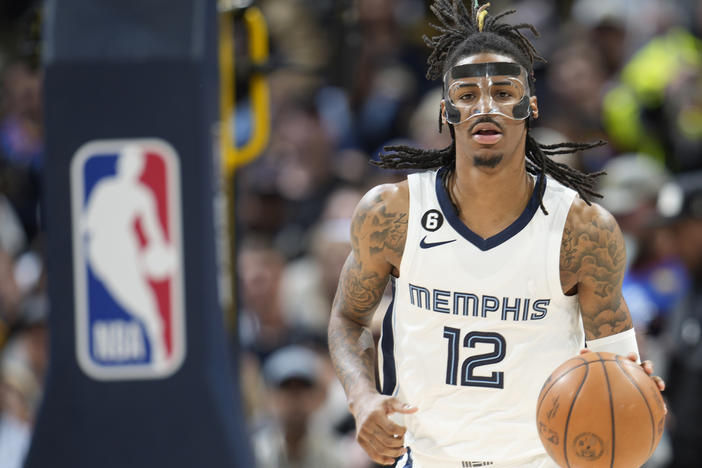 The NBA has suspended Memphis Grizzlies guard Ja Morant eight games without pay, after determining that his holding a firearm at a club in suburban Denver earlier this month was "conduct detrimental to the league."