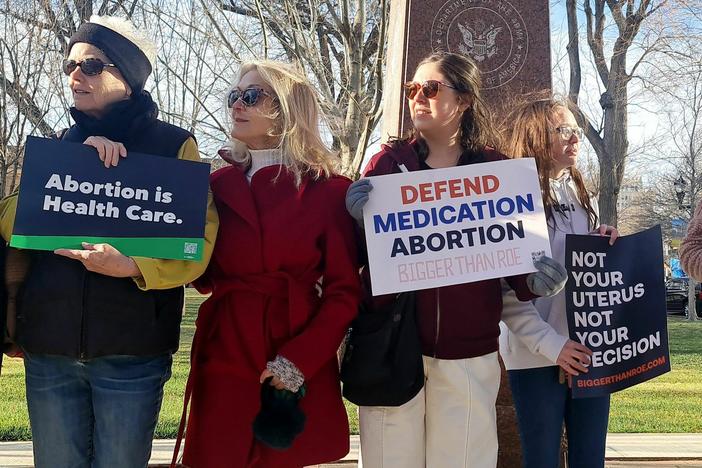 Abortion rights advocates gather in front of the J. Marvin Jones Federal Building and Courthouse in Amarillo, Texas, on Wednesday. U.S. abortion opponents are hoping to get a national ban on a widely used abortion pill through their lawsuit against the FDA.