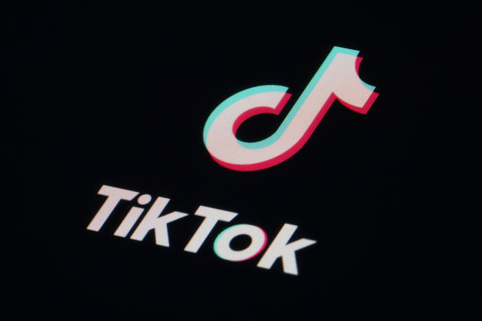 The icon for the video sharing TikTok app is seen on a smartphone on Feb. 28. British authorities said Thursday that they are banning the Chinese-owned app from government mobile phones on security grounds.