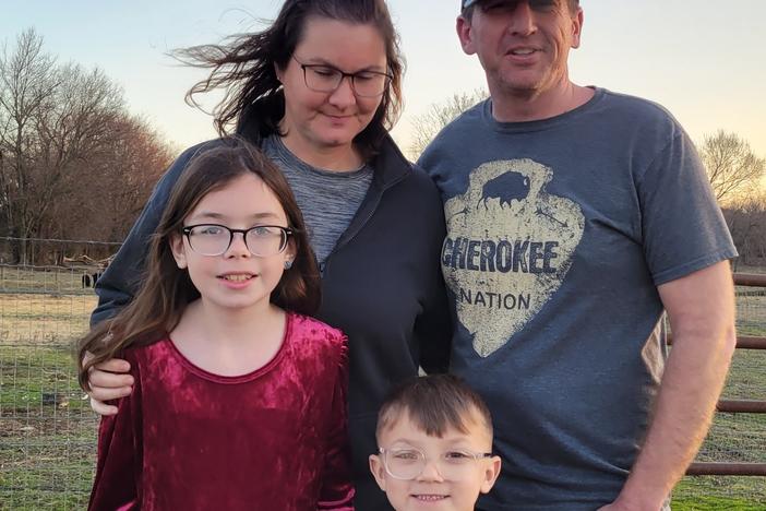"They are thriving," says Gary Walker of his adopted children Mazzy and Ransom.  The hope is that with better addiction care, more Cherokee children can remain in intact families.