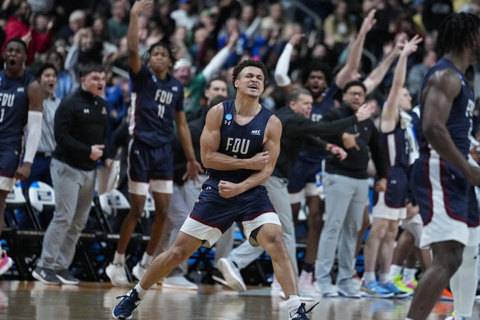 Fairleigh Dickinson guard Grant Singleton, center, celebrates after a basket against Purdue in the second half of a first-round college basketball game in the men's NCAA Tournament in Columbus, Ohio, on Friday. FDU would go on to take the win, upsetting top-seeded Purdue University.
