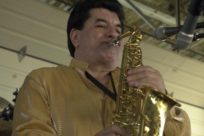 Fito Olivares performs during the Cinco de Mayo celebration held at Rosedale Park on May 5, 2002 in San Antonio, Texas. Olivares, known for songs that were wedding and quinceañera mainstays including the hit "Juana La Cubana," died Friday. He was 75.
