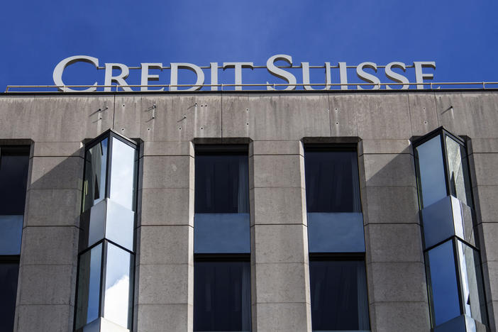 A Credit Suisse bank branch seen in Geneva. The bank was acquired by UBS on Sunday.