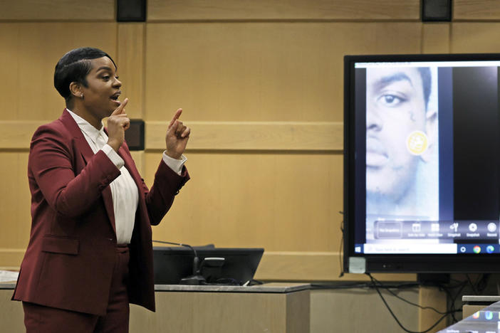 Assistant State Attorney Pascale Achille gives her closing rebuttal with a photograph of suspected shooting accomplice Dedrick Williams displayed on a courtroom monitor March 8 in the XXXTentacion murder trial at the Broward County Courthouse in Fort Lauderdale, Fla.