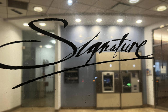 A branch of Signature Bank is photographed, late Sunday, March 12, 2023, in New York. New York Community Bank has agreed to buy a significant chunk of the failed Signature Bank in a $2.7 billion deal, the Federal Deposit Insurance Corp., said late Sunday, March 19, 2023.