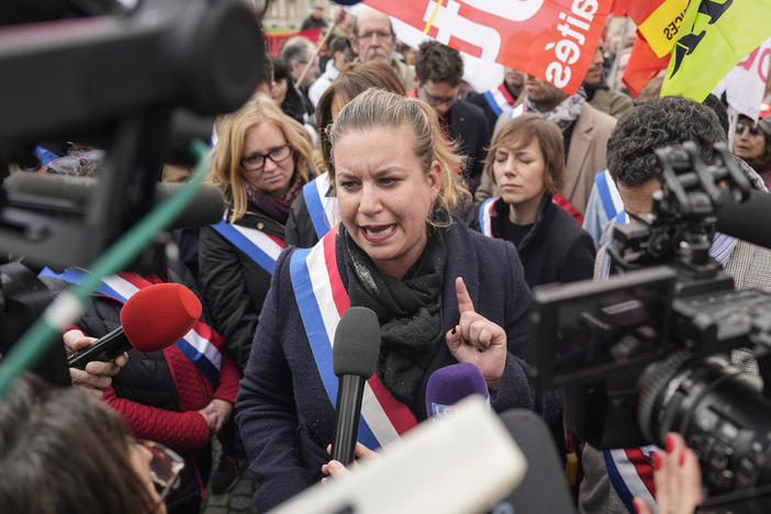 Lawmaker and far-left group leader Mathilde Panot gestures as she speaks to the media Monday during a protest against the retirement bill in Paris.