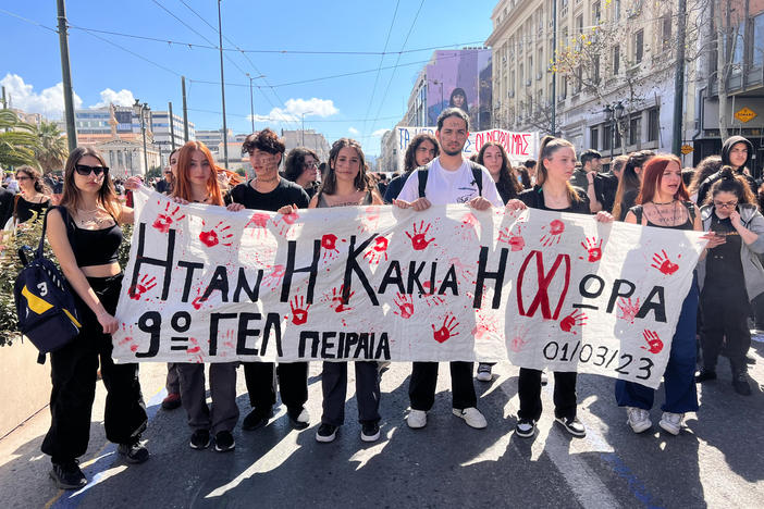 High school classmates march in Athens, Greece, during a general strike in March, following a train collision that left 57 people dead, many of them young people. The students chanted, "The young generation will not forgive you."