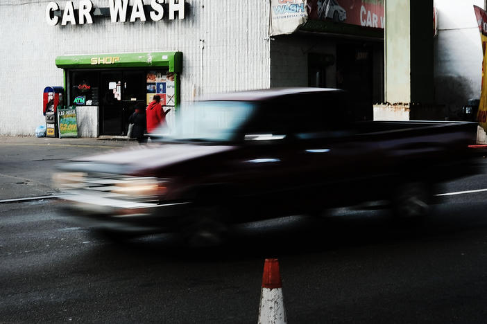 A truck drives by a car wash in New York City. Public officials are warning Jewish customers of price gouging at local car washes ahead of Passover.