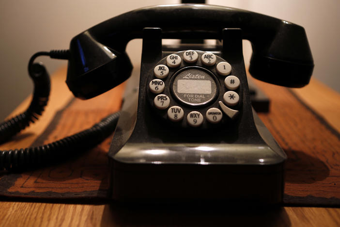 This Wednesday, April 14, 2016, file photo, shows a push-button landline telephone, in Whitefield, Maine.