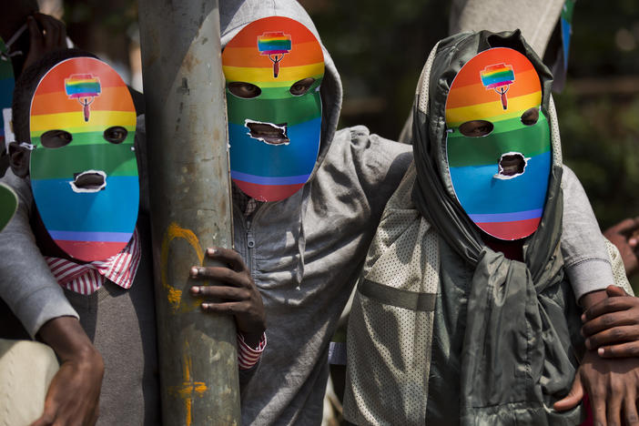Kenyan gays and lesbians and others supporting their cause wear masks to preserve their anonymity as they stage a rare protest against Uganda's tough stance against homosexuality and in solidarity with their counterparts there, outside the Uganda High Commission in Nairobi, Kenya, in 2014.