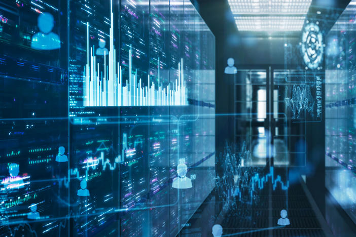 Futuristic server room with the flowing people and data.
