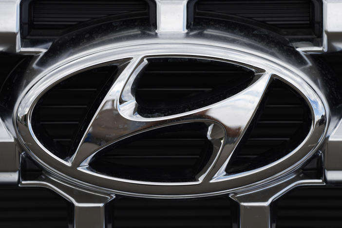 Hyundai and Kia are telling owners of over 571,000 SUVs and minivans in the U.S. to park them outdoors because the tow hitch harnesses can catch fire while they are parked or being driven. The Korean automakers are recalling the vehicles.