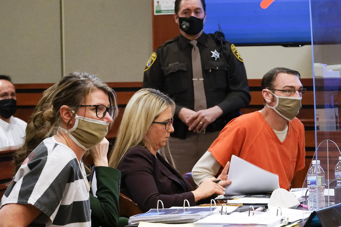 Jennifer Crumbley (left) and James Crumbley (right), the parents of Ethan Crumbley, a teenager accused of killing four students in a shooting at Oxford High School in Oxford, Mich., appear in court in Rochester Hills, Mich., on Feb. 8, 2022. Jennifer and James Crumbley can face trial for involuntary manslaughter, the state appeals court said Thursday.