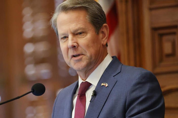 Georgia Gov. Brian Kemp, seen delivering the State of the State address on Jan. 25, has signed a bill that would ban most gender-affirming surgeries and hormone replacement therapies for transgender people under 18.