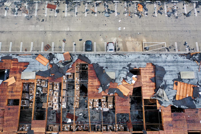 An aerial view of roof damage after a rare confirmed tornado touched down and ripped up building roofs in a Los Angeles suburb on Wednesday in Montebello, Calif.