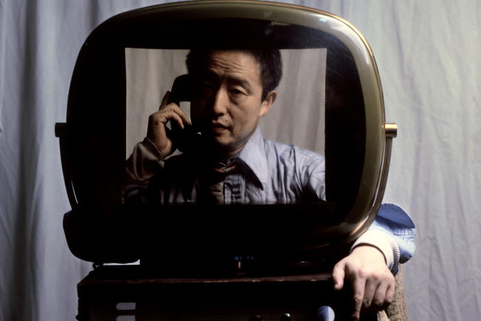 Nam June Paik, a Korean-born artist who blazed a trail in the fine art world by using video as a medium, is the subject of the new documentary <em>Nam June Paik: Moon Is the Oldest TV. </em> Above, the artist in 1982.
