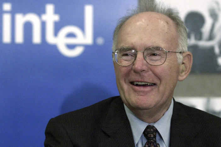 Gordon Moore, the legendary Intel Corp. co-founder who predicted the growth of the semiconductor industry, smiles during a news conference in 2001.