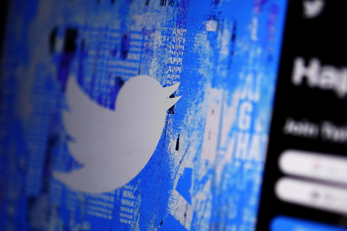The Twitter splash page is seen on a digital device in 2022 in San Diego. Some parts of Twitter's source code, the fundamental computer code on which the social network operates, were leaked online, the social media company said in a legal filing on Sunday.