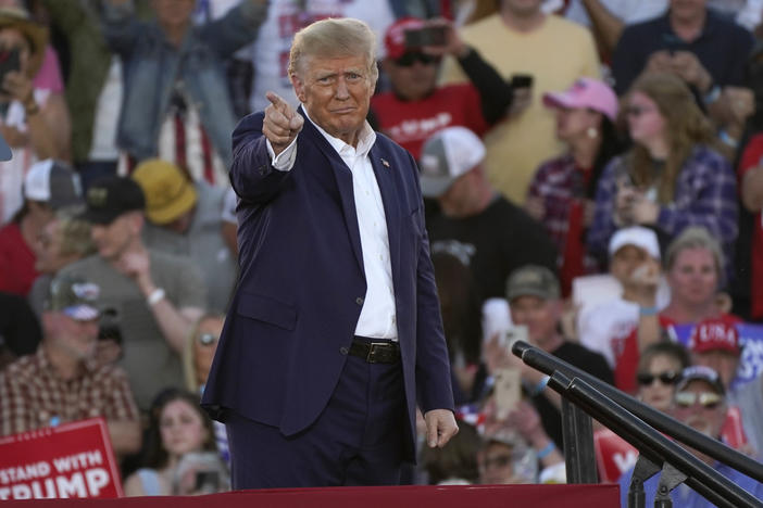 Former President Donald Trump gestures to supporters after speaking at a campaign rally at Waco Regional Airport on Saturday in Waco, Texas.