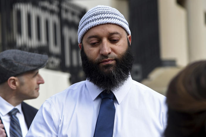 Adnan Syed gets emotional as he speaks to reporters outside the Robert C. Murphy Courts of Appeal building after a hearing on Feb. 2 in Annapolis, Md.