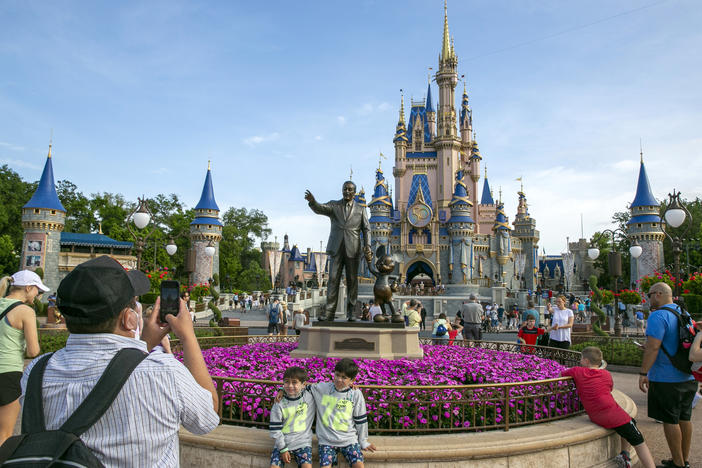 People visit Walt Disney World in Lake Buena Vista, Fla., on April 18, 2022.
