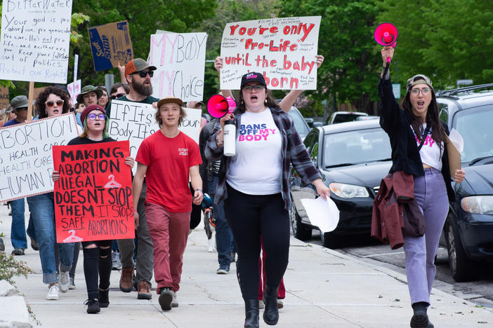 Pro-abortion rights advocates march in Boise, Idaho following the publication of a leaked U.S. Supreme Court draft opinion to overturn <em>Roe v. Wade</em> in May 2022.
