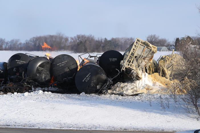 The scene Thursday morning after a BNSF train carrying ethanol and corn syrup derailed and caught fire in the west-central Minnesota town of Raymond. Residents living near the derailment were evacuated in the middle of the night.