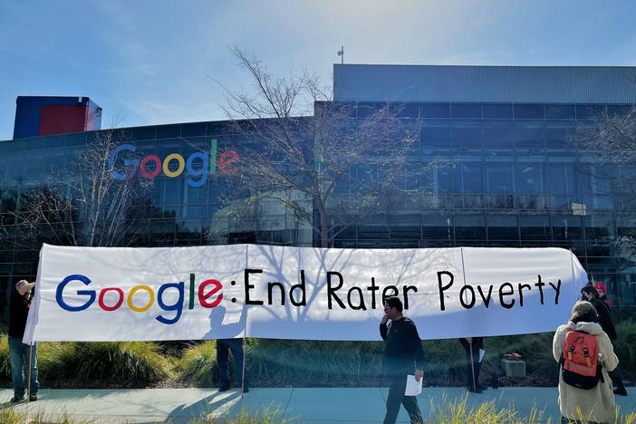 Google raters get ready for a rally at the company's Silicon Valley headquarters on Feb. 1, 2023.