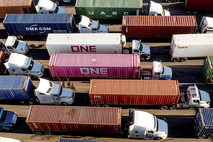 Trucks line up to enter a Port of Oakland shipping terminal on Nov. 10, 2021, in Oakland, Calif. President Joe Biden's administration cleared the way for California's plan to phase out a wide range of diesel-powered trucks, a part of the state's efforts to drastically cut planet-warming emissions and improve air quality in heavy-traffic areas.