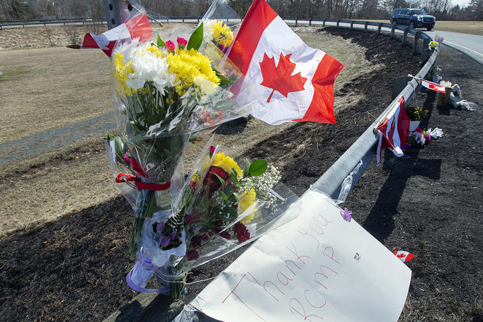 A memorial pays tribute to Royal Canadian Mounted Police Constable Heidi Stevenson, a mother of two and a 23-year veteran of the force, along the highway in Shubenacadie, Nova Scotia, on Tuesday, April 21, 2020.