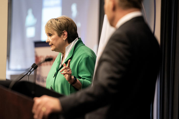Judge Janet Protasiewicz points at former Justice Dan Kelly during a debate March 21 at the State Bar Center in Madison, Wis.