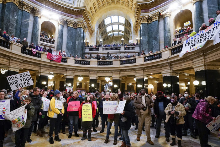 Protesters are seen in the Wisconsin Capitol during a march supporting overturning Wisconsin's near-total ban on abortion on Jan. 22, 2023, in Madison, Wis. The outcome of Tuesday's supreme court race could change abortion rights in the state.