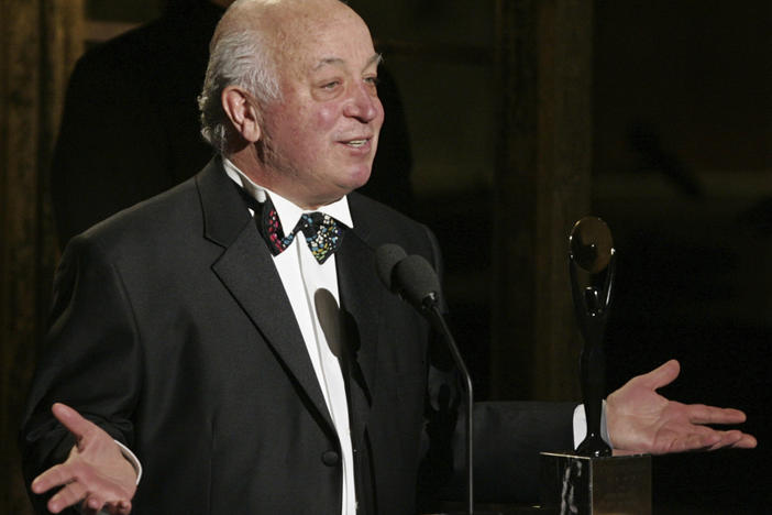 Seymour Stein accepts his award during the Rock and Roll Hall of Fame induction ceremony, Monday, March 14, 2005, in New York.