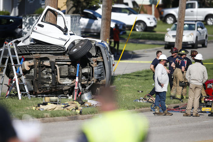 Emergency workers work the scene of a fatal car accident in August 2021 in Tulsa, Okla. Nearly 43,000 people died in U.S. traffic crashes in 2021, with deaths due to speeding and impaired or distracted driving on the rise.