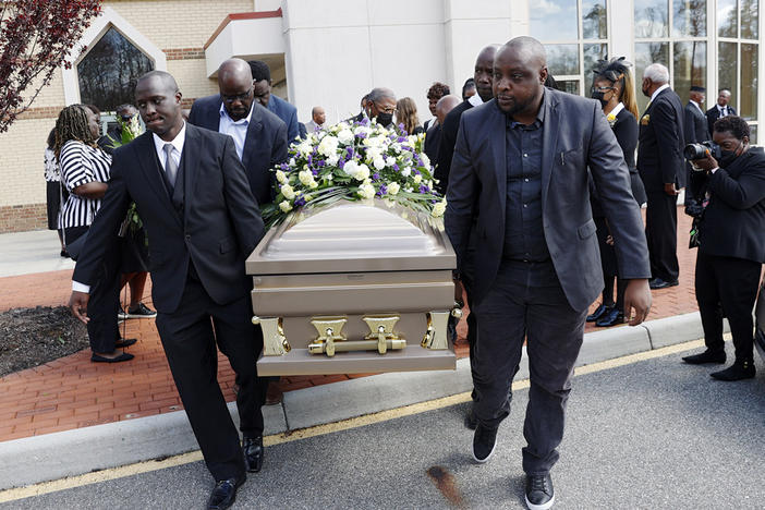 The casket of Irvo Otieno is carried out of First Baptist Church of South Richmond on March 29 after the celebration of life for Irvo Otieno in North Chesterfield, Va. The 28-year-old Black man died after he was pinned to the floor by seven sheriff's deputies and several others while he was being admitted to a mental hospital.
