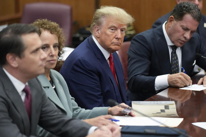 Former President Donald Trump sits with his defense team in a Manhattan court on Tuesday.