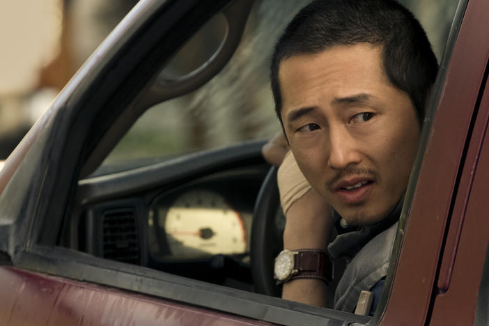 Steven Yeun as Danny, who may regret following that car.